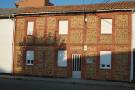 Otra casa con fachada construida al estilo de la anterior situada en la plaza principal del pueblo